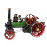 A live steam 1" scale model traction engine “Minnie”. A fully working model, finished in green