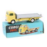 Corgi Commer (5 Ton) Platform Lorry (454). In yellow with silver load platform, flat spun wheels. In