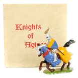 A Britains ‘Knights of Agincourt’ No9493 Mounted knight with sword. Gold crested helmet, blue over