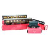 A quantity of Hornby-Dublo 2-rail railway. Including 2 x Engine shed (2-road). 2 x Engine shed