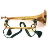 †A late 19th century French brass cavalry trumpet, by “Couesnon & Cie, Fournisseurs de l’Armée, 94