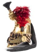 †A very good French dragoon officer’s helmet, c 1840-1845, gilt skull with leopard skin turban, tall