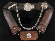 A Victorian officer’s silver mounted shoulder belt and pouch of the 40th Pathans, of brown