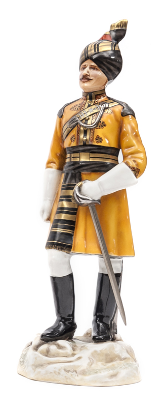 A Michael Sutty painted porcelain figure of an officer “Skinner’s Horse”, in full dress with turban,