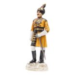A Michael Sutty painted porcelain figure of an officer “Skinner’s Horse”, in full dress with turban,