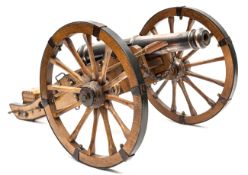 A large well made model of a French Napoleonic period field gun, 25” overall, the copper plated iron