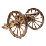 A large well made model of a French Napoleonic period field gun, 25” overall, the copper plated iron