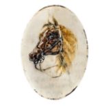 A well executed miniature horse’s head on ivory oval disc, 3½” x 2½”, inscribed on the back in