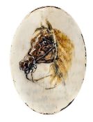 A well executed miniature horse’s head on ivory oval disc, 3½” x 2½”, inscribed on the back in