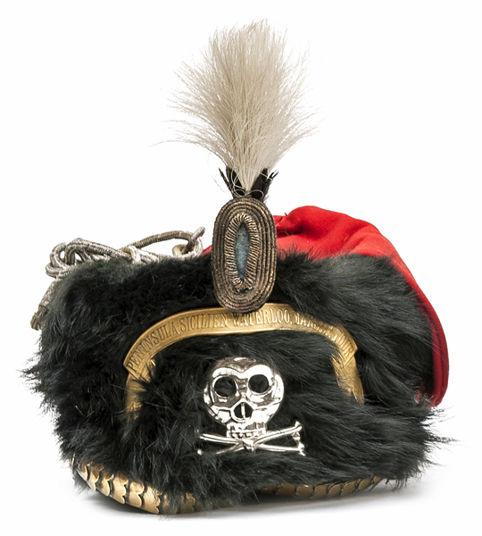 †An Imperial German M1883 officer’s busby of the 17th (Brunswick) Hussars, of black bearskin with