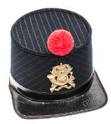 An OR’s 1861 pattern quilted shako of The Monmouthshire Rifle Volunteers, patent leather headband,