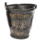 A leather fire bucket from HMS Victory, painted with ship’s name and “GR” and “1803”, height 10”,