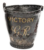 A leather fire bucket from HMS Victory, painted with ship’s name and “GR” and “1803”, height 10”,