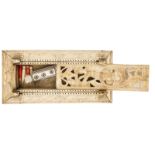 A French Napoleonic prisoner of war carved bone games box, the top panels carved with foliate