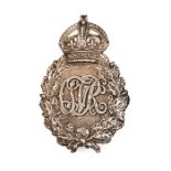 A post 1902 WM pouch belt badge of the Civil Service Volunteer Rifles, CSVR monogram within