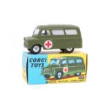 Corgi Toys Bedford Military Ambulance (414). In matt olive green with opaque rear windows, red