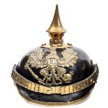 †A Prussian line infantry NCO’s M1867/71 pickelhaube, with perlring and chinscales and nickel silver