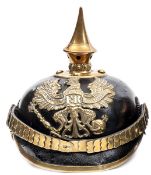 †A Prussian line infantry NCO’s M1867/71 pickelhaube, with perlring and chinscales and nickel silver