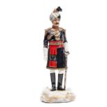 A Michael Sutty painted porcelain figure of an officer “Probyn’s Horse”, in full dress with