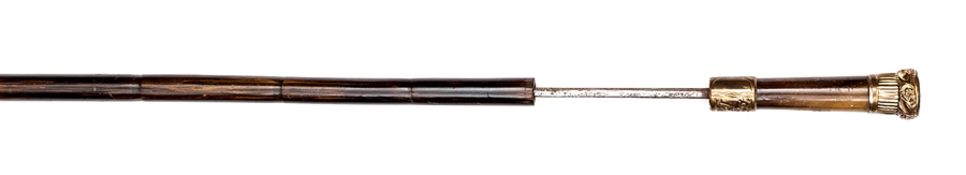 A Victorian swordstick, squared blade 27” tapering to a single. Horn grip with gilt mounts, bamboo