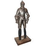 A composite suit of light field armour in the mid 16th century Italian style, comprising close