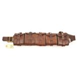 A Swedish (?) brown leather bandolier of 5 pouches, brass and alloy buckle and studs, no visible