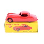 Dinky Toys Jaguar XK120 Coupe 157. In bright red with bright red wheels and black tyres. Boxed.