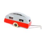 A rare Dinky Toys Caravan 30g. An example in grey and red with black smooth wheels and white