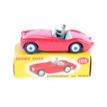 A scarce Dinky Toys Austin-Healey ‘100’ Sports 103. ‘Touring finish’ in bright red with light grey