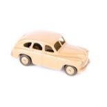 Dinky Toys Standard Vanguard 40e. An example in fawn with open rear wheel arches, fawn wheels, black
