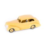 A rare Dinky Toys Oldsmobile Sedan 39b. With tan body and tan ridged wheels, black tyres and mottled