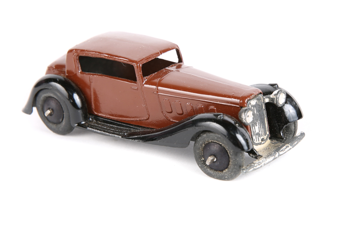 Dinky Toys Humber Vogue 36c. In dark chocolate brown with black closed chassis, smooth wheels with