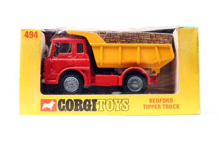 Corgi Toys Bedford (TK) Tipper Truck 494. An example with red chassis cab and yellow tipper body. In