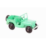 A rare Dinky Toys Jeep 25J 1947-1948. In light green with black wheels and black tyres, with screen,