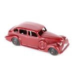 Dinky Toys Buick Viceroy 39d. In maroon with black ridged wheels and black tyres, black base. GC-VGC
