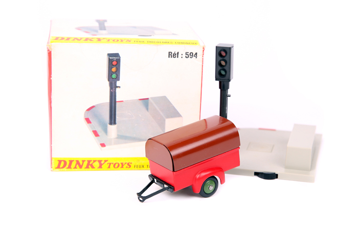2 French Dinky Toys. A loose single axle covered trailer 25T. An example in red with dark brown