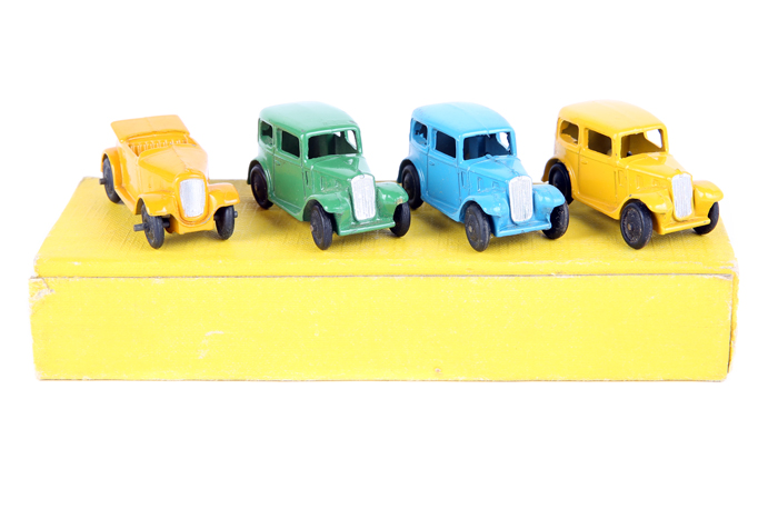 A trade pack of ‘6 Midget Saloons’ 35A. Comprising 3 examples, yellow, mid blue and green. Plus an