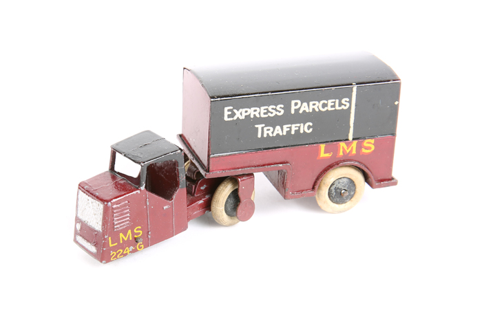 A Dinky Toys Railway Mechanical Horse and Trailer Van 33r. An example in LMS Express Parcels Traffic