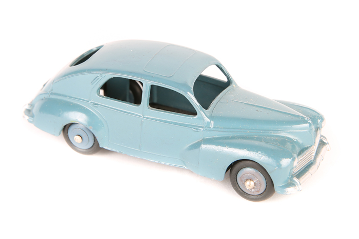 French Dinky Peugeot 203 24r. In Air Force style greyish blue with the same colour for the ridged