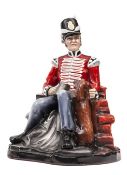 A Michael Sutty painted porcelain figure of a Napoleonic period “Grenadier”, in full dress with “