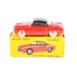 French Dinky Toys Volkswagen Karmann Ghia 24M. In deep red with gloss black roof, example with