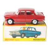 French Dinky Toys Moskvitch (1410). In maroon with cream interior, with windows, dished spun