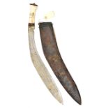 A large kukri, blade 20”, with brass inlaid designs to one side (worn), incised panel along back