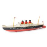 A 1950’s German tinplate clockwork 3 funnel ocean liner by Arnold. 33cm in length, beam 6cm and