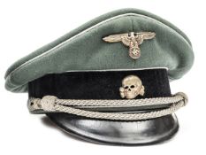 A Waffen SS General’s peaked cap. Field grey excellent quality material. Silver plated finely