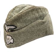 A Waffen SS man’s forage cap, field grey serge material with machine sewn BeVo eagle and skull