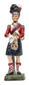 A continental painted porcelain figure of an officer “93rd Highlanders, 1815”, in full dress,