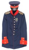 An Imperial German officer’s peaked cap and tunic of the 176th Regiment, c 1914, blue cloth cap with