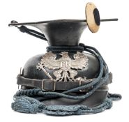 A Prussian Uhlan enlisted man’s “ersatz” Lance Cap (Tschapka), of all steel construction, with a