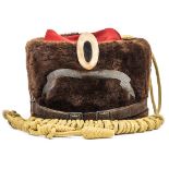An Imperial German other ranks Hussar busby (Pelzmutze), of brown fur with scarlet bag, yellow cap